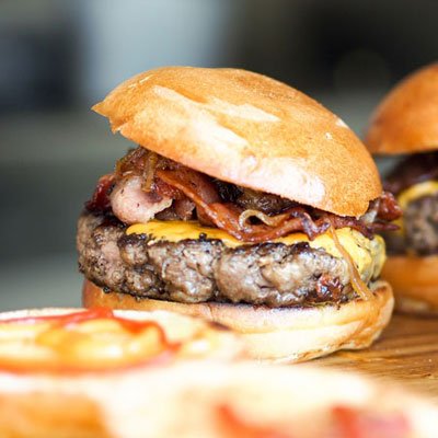 juicy burgers on a cutting board